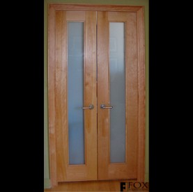 A pair of birch closet doors