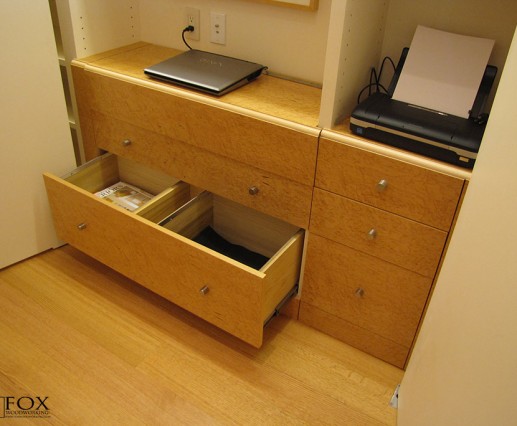 A birdseye maple closet desk with file drawer.