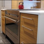 Besides the octagonal kitchen island, we built these teak island cabinets and range.
