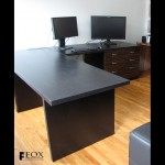 Unlike the sapele desk, this desk is made with an ebony veneer top and macassar ebony door and drawer fronts.