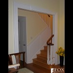Besides the sapele handrail, there is also a hand-carved sapele turnout and painted wainscot.