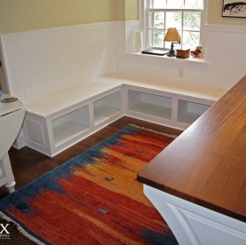 A view of the bench seating and storage in the alcove.