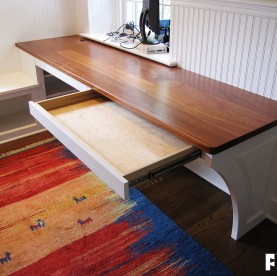 A view of an alcove desk made of solid sapele and painted poplar.