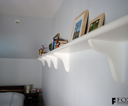 A painted wall shelf.